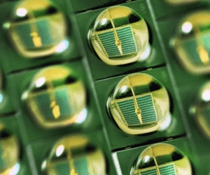 A close up of a green circuit board